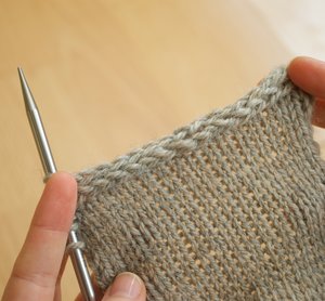 the yarn into a tapestry needle